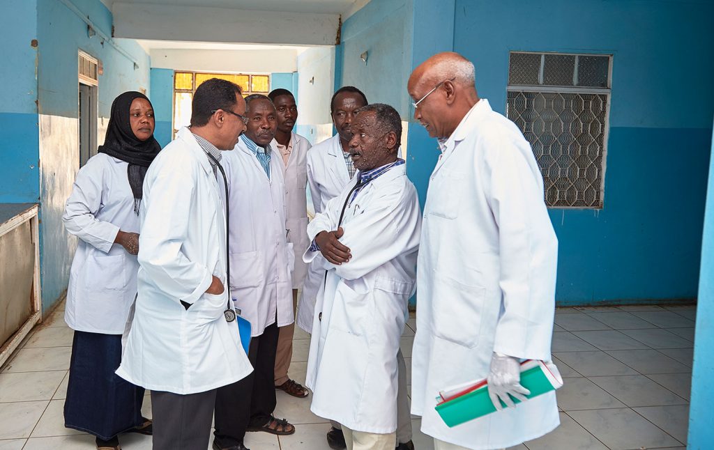 Doctors and nurses discussing in the corridor of the Dooka Hospital in Sudan
