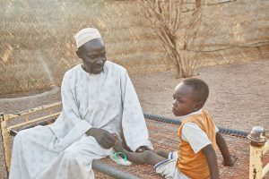 Young VL patient with his father